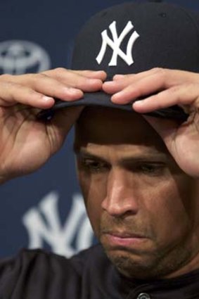New York Yankee Alex Rodriguez, baseball's highest-paid player and one of the sport's greatest hitters, was suspended for a record 211 games for his involvement in a doping scandal.