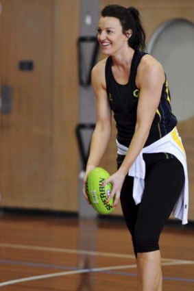 Vixens captain Bianca Chatfield works on her AFL skills.