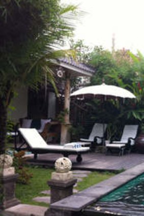 Comfortable luxury: Geoffrey and Michael's Ubud home, featuring a pool and landscaped gardens.