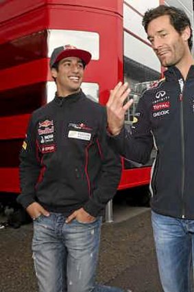 Ricciardo, left, with Mark Webber.
