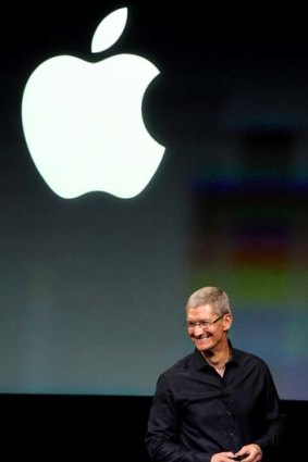 Apple CEO Tim Cook speaks at the event.
