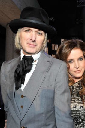 With her current husband, music producer Michael Lockwood, in 2012.