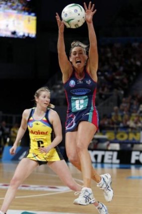 Elissa Macleod of the Melbourne Vixens stretches for the ball against Central Pulse at Hisense Arena when the teams met in 2013.