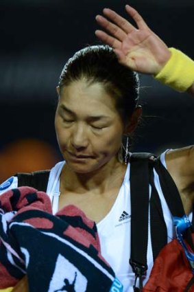 Farewell ... Japan's Kimiko Date-Krumm waves after defeat in her match against Bojana Jovanovski.