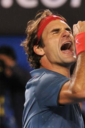 Victory in four: Roger Federer lets off steam after his win over Andy Murray on Wednesday.