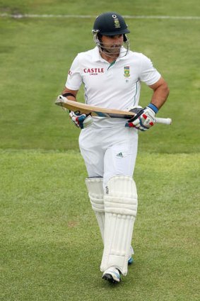Important knock ... Dean Elgar of South Africa leaves the field after getting out to Nathan Lyon of Australia for 83.