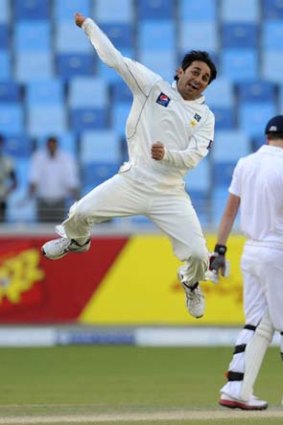 Saeed Ajmal celebrates a wicket.