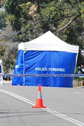 A police forensic tent outside the Morley house.