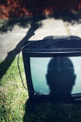 Patrick Pound is fascinated by hard waste collections and took this ''self-portrait'' with discarded TV.