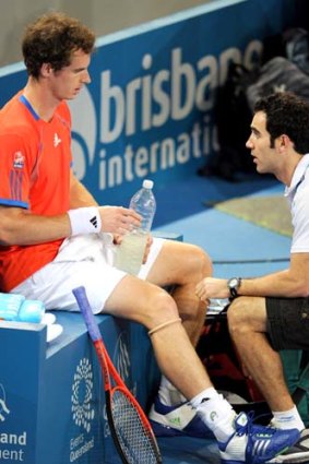 Worse for wear ... Andy Murray receives treatment during his first-round win over Kazakh Mikhail Kukushkin.