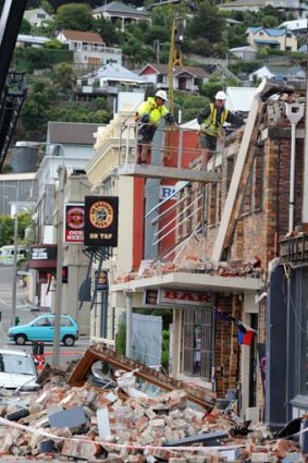 Engineers check the structure of a badly-damaged building in the port town of Lyttelton - the epicentre of the 6.3 earthquake.