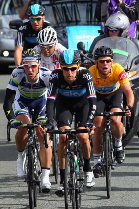 Next in line: Leigh Howard, left, and Mark Cavendish, right, on Bradley Wiggins' wheel in the Tour of Britain.