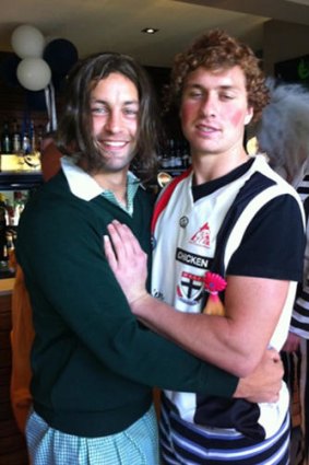 Jimmy Bartel (left) and Mitch Duncan show off their costumes.