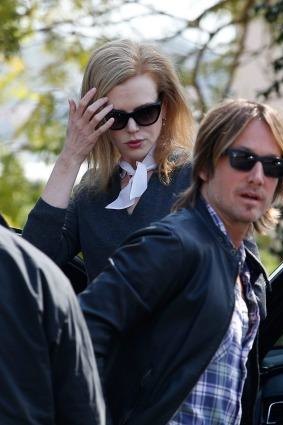 Nicole Kidman and her husband, Keith Urban, arrive at her parents' house in Sydney on Friday.