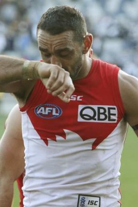 Swans captain Adam Goodes sheds a tear as he walks off the ground after his team's win over the Cats in 2011.