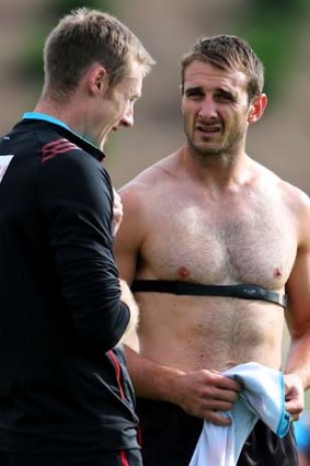 Prepared for battle: Essendon’s Jobe Watson (right) at training on Tuesday.
