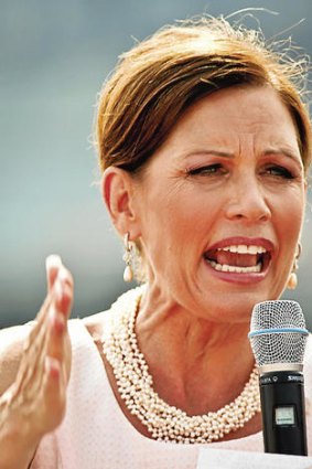 No longer a candidate … fellow conservative Michele Bachmann has shown no signs of following Palin's lead.