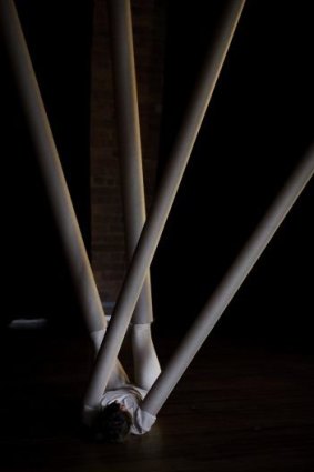 Sarah Aiken's choreography uses cardboard tubes.