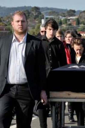 John Zeleznikow leads mourners at the funeral of his father.