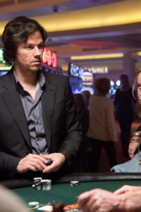 High stakes: Jim Bennett (Mark Wahlberg) and Amy (Brie Larson) in <i>The Gambler</i>.