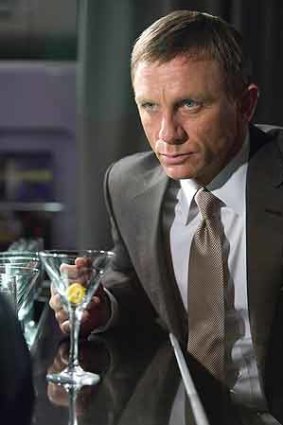 Daniel Craig downs a martini in Quantum of Solace.