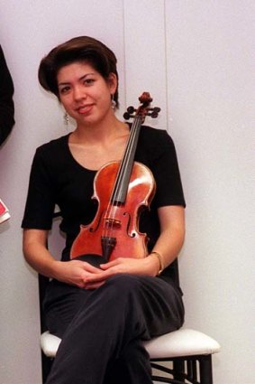 Delivered a glowing solo performance ... guest concertmaster Natalie Chee.