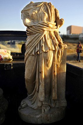 The storm uncovered this statue in Ashkelon and smashed retaining walls protecting the port of Caesarea.