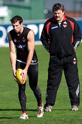 Brian Taylor gives Kyle Hardingham some tips at training yesterday.