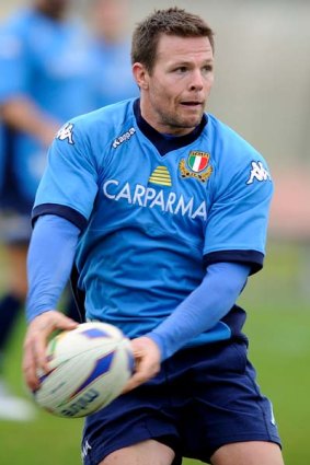 From Australian football to rugby for Italy ... Kris Burton.