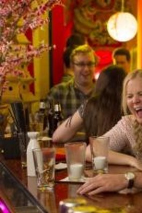 Amy Schumer as Amy and Bill Hader as Aaron on a date in <i>Trainwreck</i>.