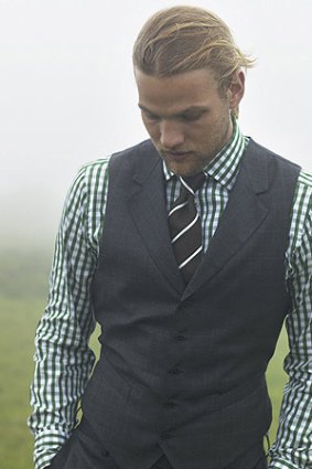 A micro check shirt can make a strong statement as long as it doesn't jar with the suit.