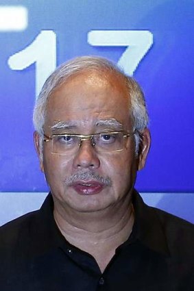 Malaysian prime minister Najib Razak addresses reporters in Kuala Lumpur.