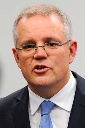 Immigration Minister Scott Morrison speaking to the media on Thursday.