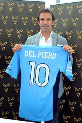 Signed ... Alessandro Del Piero poses with Sydney FC jersey.