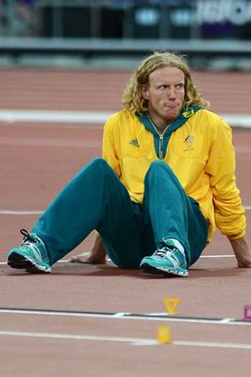 Steve Hooker looks on after competing in the men's pole vault final.