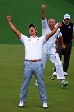 Adam Scott and Steve Williams celebrate the famous Masters win in Augusta last year.