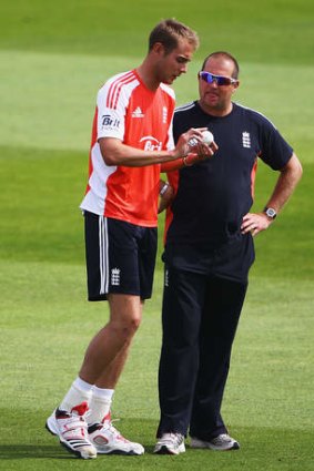 Stuart Broad chats with fast-bowling coach David Saker in the nets.
