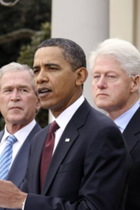 Barack Obama with George Bush and Bill Clinton.