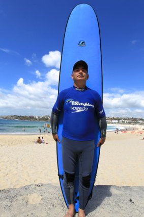 Mark Dapin with the "Biggest Surfboard in the World".