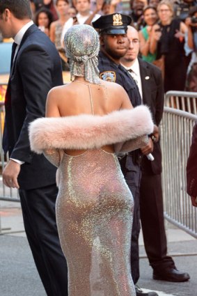 Rihanna's dress catches a local police officer's eye.
