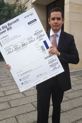 A slightly sheepish looking Ben Wyatt holds a mocked-up Colin Barnett-powered bill.