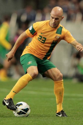 Mark Bresciano in action against Japan.