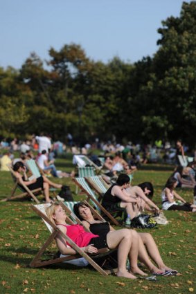 People bask in the unseasonal heatwave and Hyde Park in London.