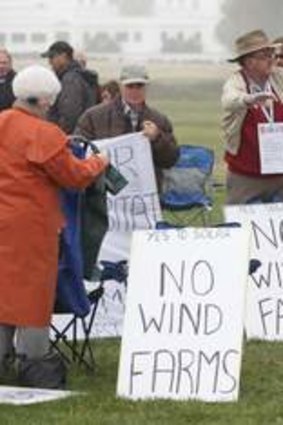 Protestors at the anti-wind farm rally out the front of Parliament House in Canberra on Tuesday June 18.