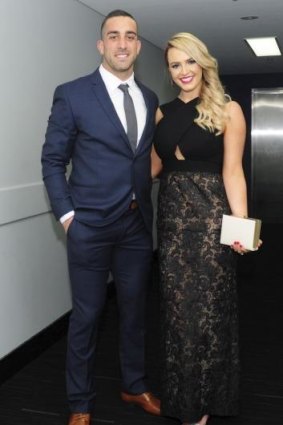 Paul Vaughan with Ellie Crossman at the Meninga Medal dinner, where his re-signing was announced.