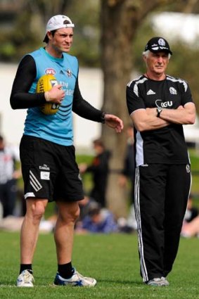 Leigh Brown with coach Mick Malthouse.