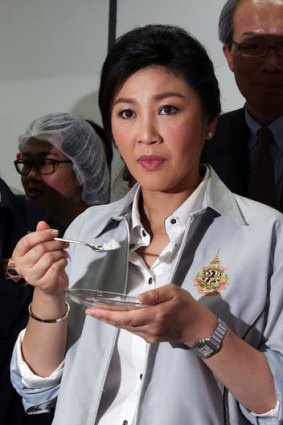 Yingluck Shinawatra ...  Her government is seeking to offload record stockpiles of rice built up through a state-buying program.