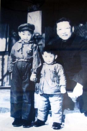 Xi Jinping, left, with his brother Yuanping and his father Xi Zhongxun before he was purged by Mao.