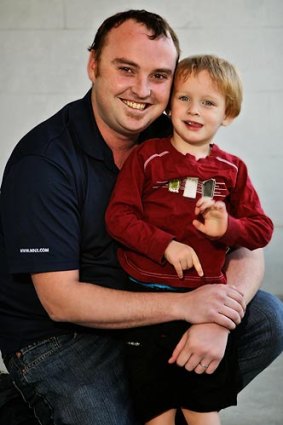 Saving money for his family was the main reason Stephen Mott, 28, (pictured with son Michael) decided to quit a couple of weeks ago using a smoking cessation drug.