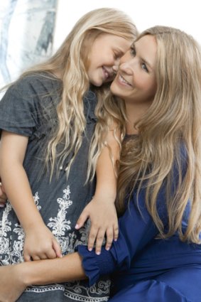 Embrace ... Collette Dinnigan with daughter Estella from the  David Jones Mother’s Day advertising campaign.